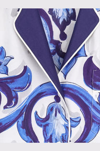 Dolce &amp; Gabbana women’s silk white pajama top with bold blue and purple floral patterns and navy inner lining edged in white trim