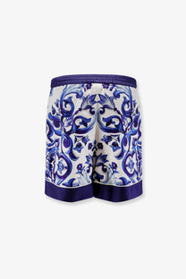 Dolce &amp; Gabbana women’s silk white shorts with bold blue ornamental pattern and matching navy trim