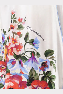 Dolce &amp; gabbana women’s white silk shorts paired with a cream silk floral print scarf featuring red blue and pink blossoms