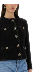 Dolce &amp; Gabbana women’s black tweed bouclé short jacket with gold tone floral buttons and black satin trim