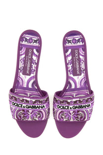 Dolce &amp; Gabbana women’s purple slide sandals with floral paisley pattern and black lettering on the strap