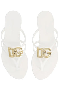 Dolce &amp; gabbana women’s white rubber flip-flops with a gold-tone dg logo clasp on the slide strap
