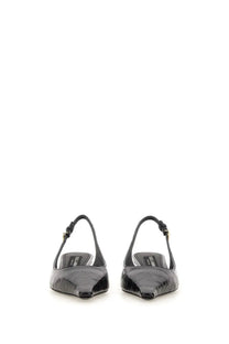 Dolce &amp; Gabbana women’s slingback flats in black crocodile embossed leather with open back design