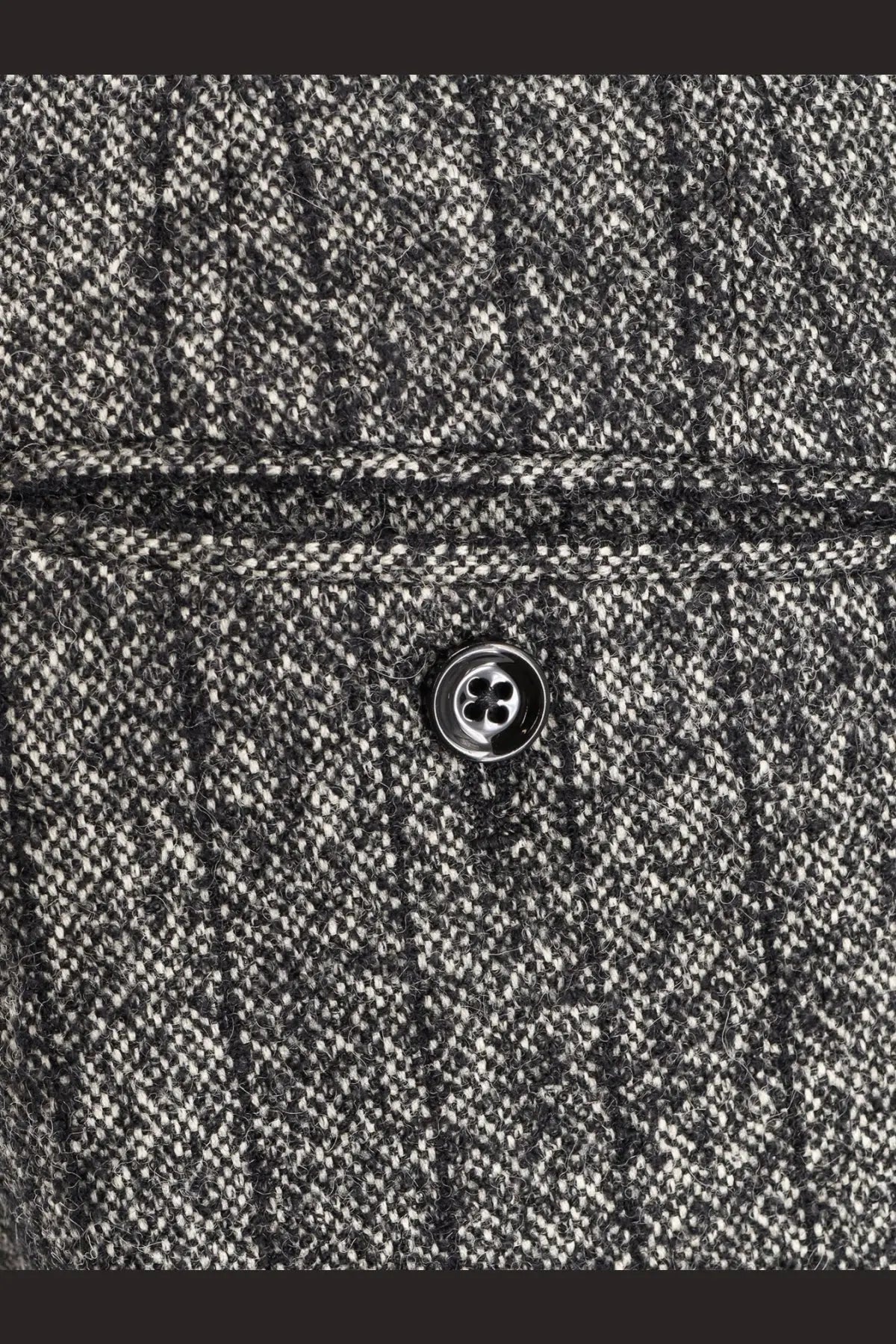 Dolce &amp; gabbana women’s striped wool blend trousers paired with a dark gray and white herringbone wool coat with black button