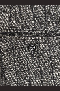 Dolce &amp; gabbana women’s striped wool blend trousers paired with a dark gray and white herringbone wool coat with black button