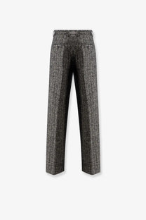 Dolce &amp; Gabbana women’s striped gray herringbone wool blend trousers with classic straight-leg and buttoned back pockets shown from back