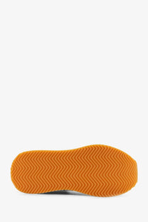 Dolce &amp; Gabbana women’s black suede sneakers orange rubber sole with zigzag tread pattern back side view