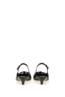 Dolce &amp; Gabbana women’s black leather slingback flats with low heel tassel and gold-tone buckle detail