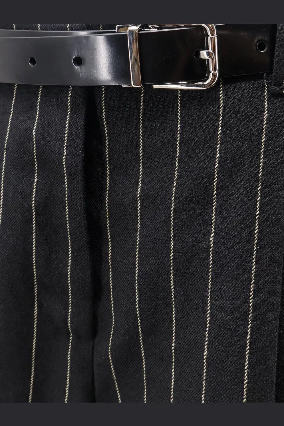 Black leather belt with silver toned buckle paired with dolce and gabbana womens wool and linen blend patterned trousers
