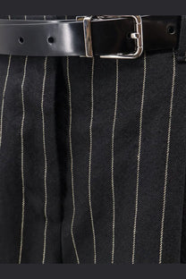 Black leather belt with silver toned buckle paired with dolce and gabbana womens wool and linen blend patterned trousers