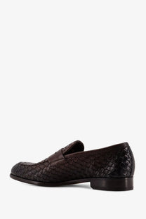 Doucal’s men’s adler leather loafers in dark brown woven leather with classic moccasin design and gold accents