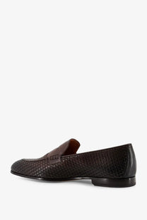 Doucal’s men’s braidy leather loafers in brown feature a classic slip-on design with a polished finish