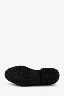 Black rubber sole with deep rugged tread and diamond grip elements on doucal’s men’s commander suede lace up shoes