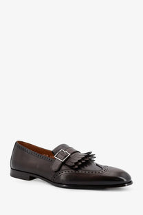 Dark brown leather loafer with silver buckle and tassel from Doucal’s men’s Decò leather loafers gold collection