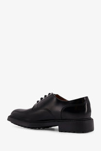 Doucal’s men’s black leather derby shoe with chunky rubber sole and classic lace-up design