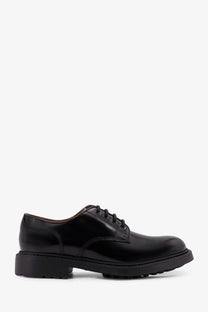 Black leather derby shoe by doucal’s with glossy finish and chunky rubber sole for men
