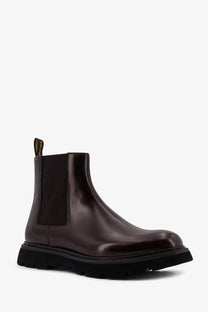 Doucal’s men’s horse leather ankle boots in dark brown with a chunky black rubber sole