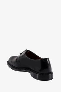 Doucal’s men’s leather lace black patent leather derby shoe with polished finish and classic lace-up design