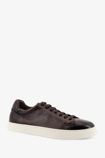 Dark brown leather low-top sneaker with white rubber sole from doucal’s men’s morgan leather sneakers gold collection