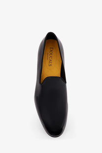 Doucal’s men’s black patent leather slip-on loafers with a sleek polished finish and contrasting yellow insole