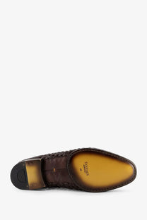 Doucal’s men’s unique leather loafers gold featuring brown woven leather with polished tan insole and black rubber heel