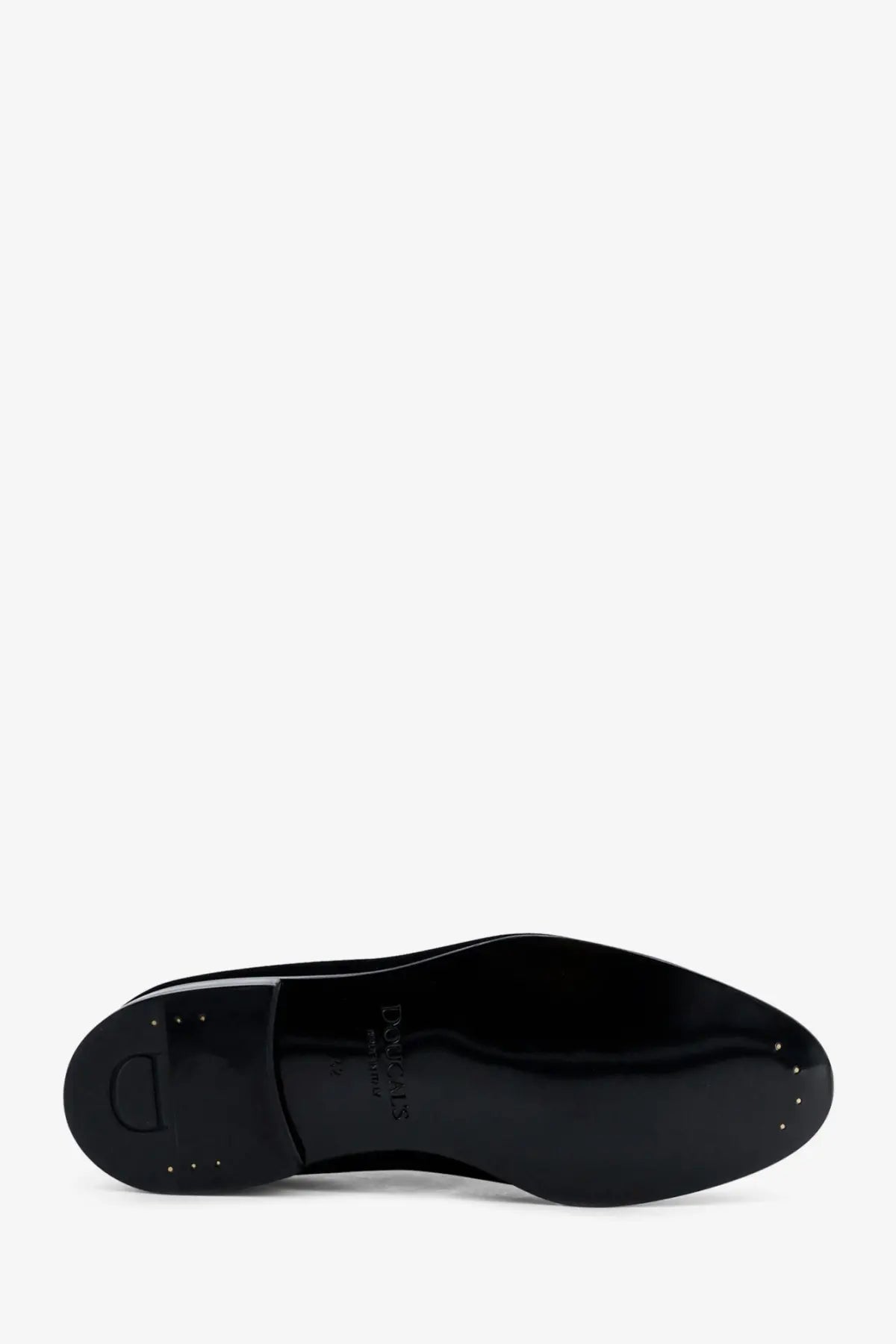 Black patent leather sole of doucal’s men’s velvet loafers with glossy finish and dior logo embossed on the back