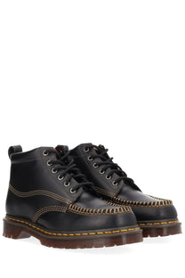 Dr martens men’s boot lowell chukka black made of black leather showing the back side of the shoe