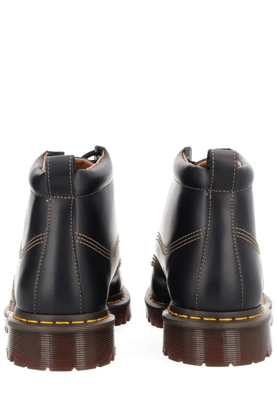 Black leather dr martens men’s boot lowell chukka showcasing durable material and classic chukka design
