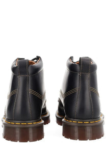 Black leather dr martens men’s boot lowell chukka showcasing durable material and classic chukka design