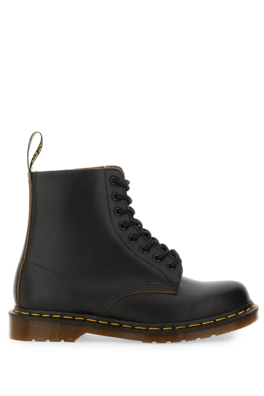 Black leather dr martens men’s boot vintage black showing the back side with classic pull tab and stitching details