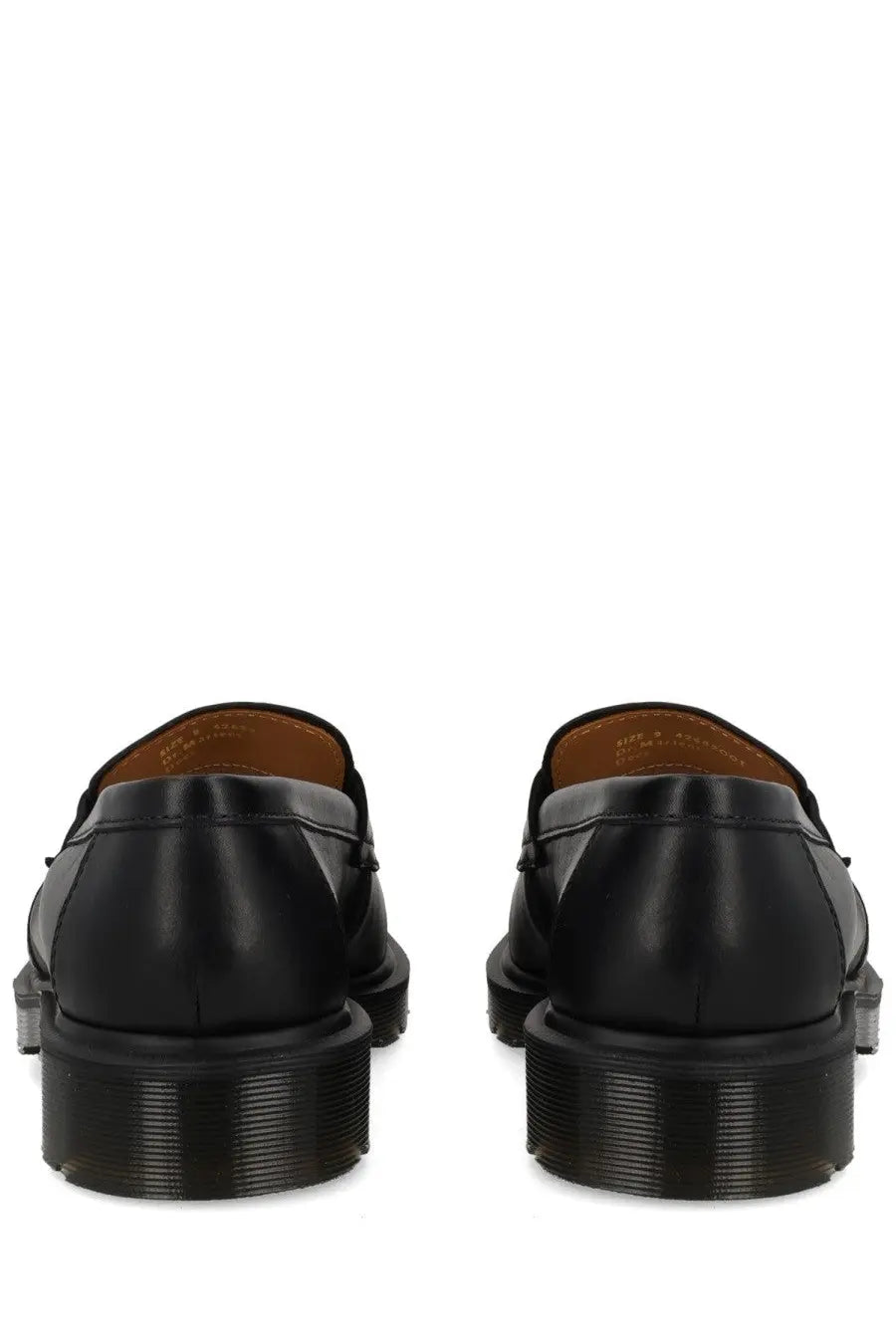Black leather dr martens unisex mocassino delapre penny shoe showing the back side with classic design features
