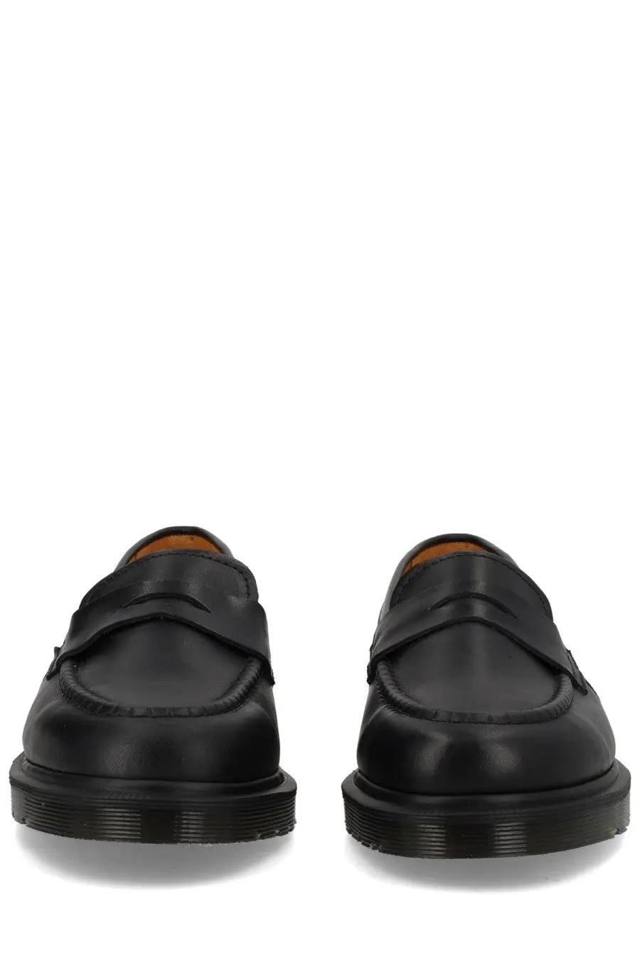 Black leather Dr Martens unisex mocassino Delapre penny shoe shown from the back side with classic penny loafer design