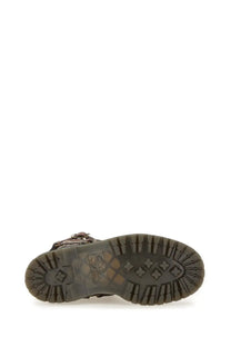 Dark brown leather dr martens women’s boot anistone with textured rubber sole and embossed logo on the back heel