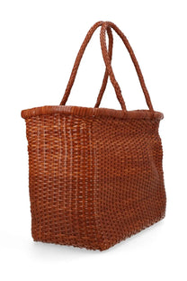 A woven brown leather tote bag with braided handles from dragon diffusion womens borsa weave large beige collection