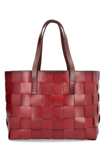 A rich burgundy woven leather tote bag with structured handles from dragon diffusion womens japan collection