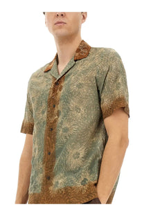 A men’s short-sleeved olive green Dries Van Noten boxy fit shirt with gold floral pattern and brown collar accents