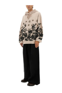 Beige Dries Van Noten men’s cotton hoodie with black floral print and a drawstring hood in white color