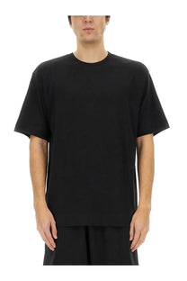 Black oversized Dries Van Noten men’s cotton crewneck t-shirt with relaxed fit and short sleeves