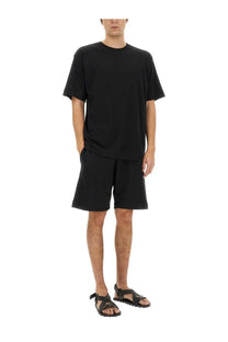Black oversized cotton t-shirt with relaxed fit and short sleeves by dries van noten men’s cotton shirt black