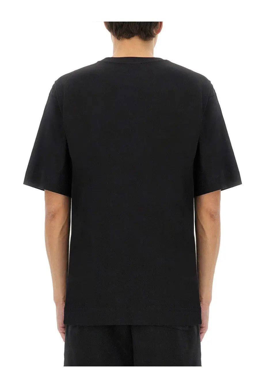 Dries Van Noten men’s black cotton short-sleeved crew neck t-shirt shown from the front side