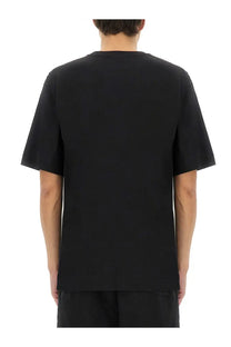 Dries Van Noten men’s black cotton short-sleeved crew neck t-shirt shown from the front side