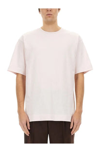 Dries Van Noten men’s off-white cotton shirt with relaxed fit and simple crew neckline in minimalist style