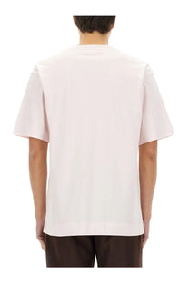 A pale pink short-sleeved crew neck cotton t-shirt by Dries Van Noten men’s cotton shirt blue collection