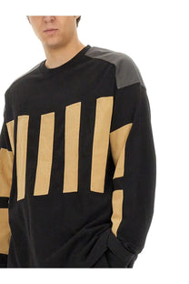 Dries Van Noten men’s black and beige cotton sweatshirt with long sleeves and contrasting shoulder and front panels