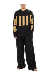 Dries Van Noten men’s black cotton sweatshirt with beige vertical stripes on chest shoulders and sleeves