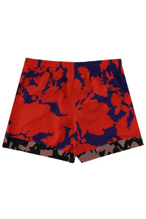 Dries Van Noten men’s floral print swim trunks in vibrant red and navy blue with camouflage hem trim