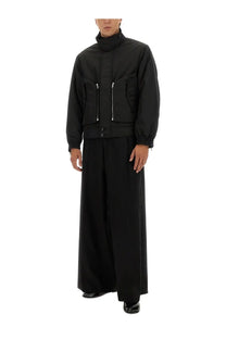 Dries Van Noten men’s black high-necked bomber jacket with silver zippers and button closures