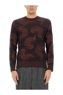 Dark brown long-sleeved knit sweater by dries van noten featuring a subtle rust-brown leaf jacquard pattern