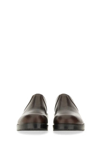 Dries Van Noten men’s leather clogs in dark brown with sleek minimalist design and black rubber soles