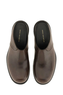 Brown leather mules by dries van noten for men featuring smooth leather and slip-on clog design